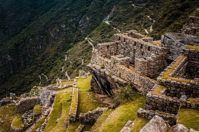 2-Day Tour: Sacred Valley and Machu Picchu by Train - Pisac: terraces, temples, and a busy market