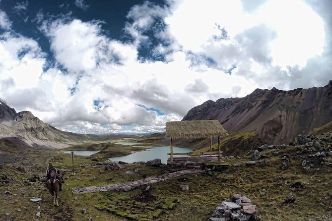 7 Lakes of Ausangate Full Day Tour from Cusco - Walking among the lakes near Ausangate