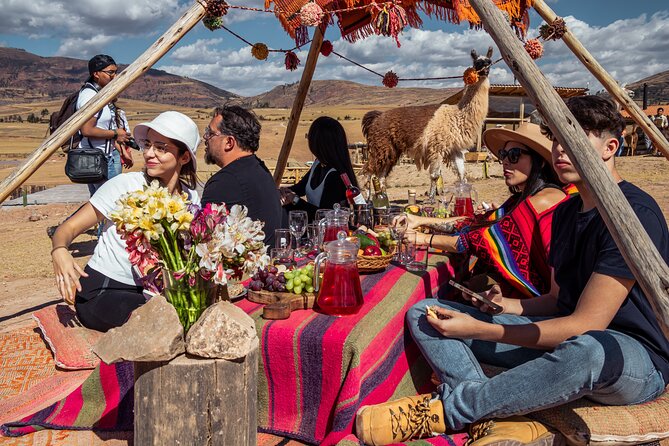 Chinchero, Moray & Maras Day Tour with Llama Picnic from Cusco - Chinchero and the living art of weaving