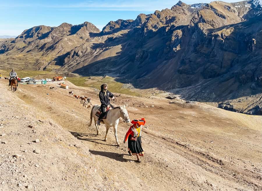 Cusco: Rainbow Mountain and Red Valley Day Trip with Meals - What to pack for a mountain that changes its mind