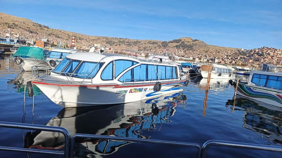 Floating Islands of Los Uros: Guided Tour, Culture and Tradition. - Leaving Puno by Boat