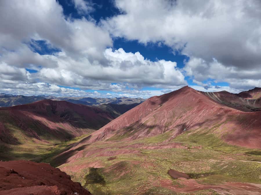 From Cusco: Full Day tour to Rainbow mountain and Red Valley - The Descent, Cusipata Buffet, and Long Ride Home