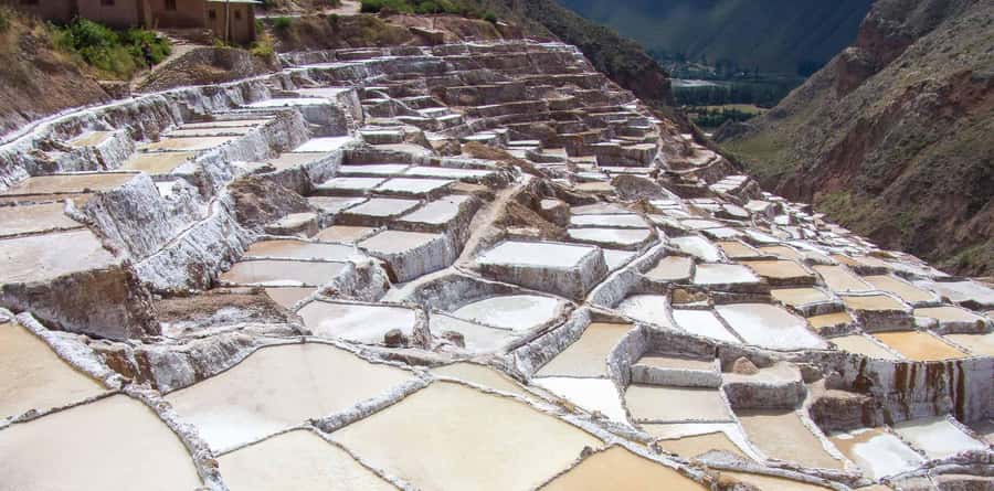 From Cusco: Moray, Maras, and Salt Mines Half-Day Tour - Chinchero at 3,762 meters: textiles and open farmland