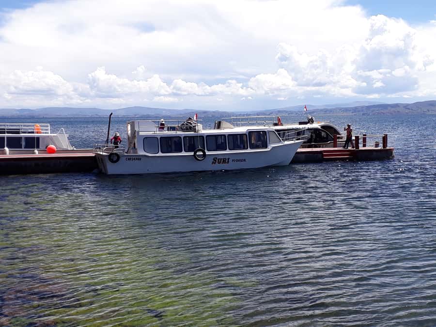From Puno: Floating Islands of the Uros Half-Day Tour - Leaving Puno for the open water