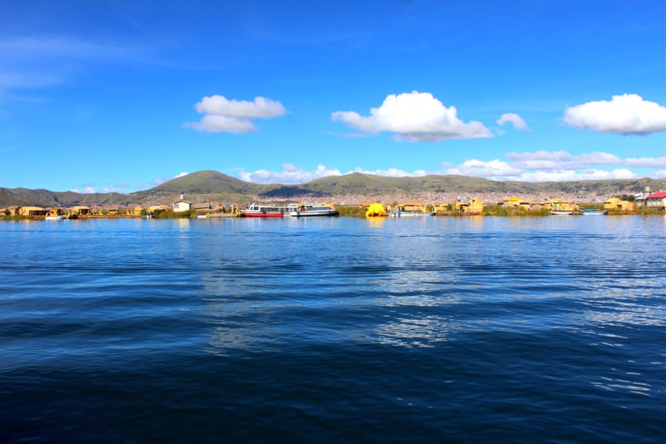 From Puno: Uros floating islands half Day tour - Meeting the Uros community