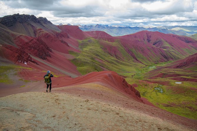 Full-Day Rainbow Mountain & Red Valley Small-Group Trek from Cusco - Hiking through the green valley toward Ausangate