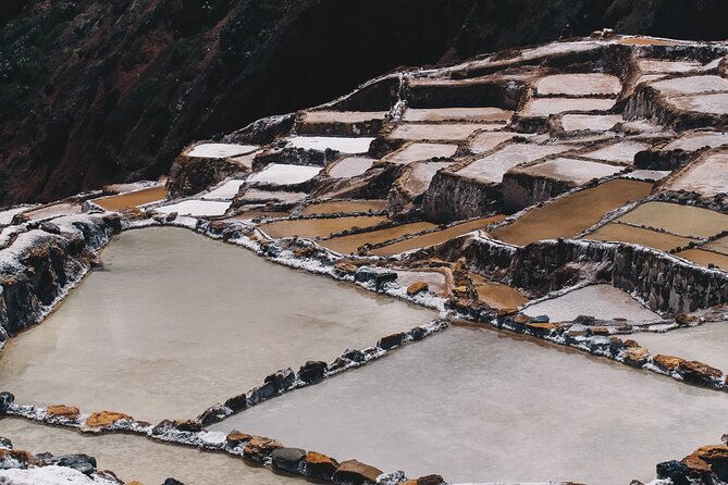 Full-Day Sacred Valley Tour from Cusco - Maras Salt Mines show a working Andean tradition