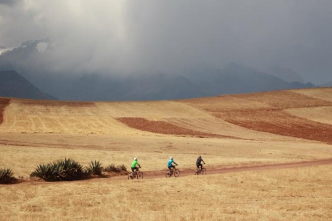 Half-Day Cycling Tour of Maras and Moray from Cusco - Riding the mountain roads with the supplied gear