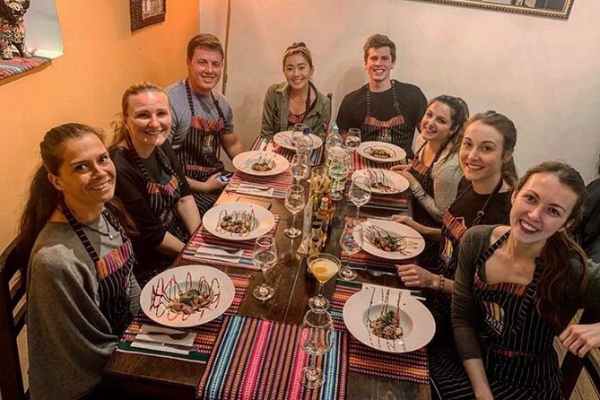 Hands-on Peruvian Cooking Class & San Pedro Market Visit in Cusco - Starting beneath the arches of San Pedro Market