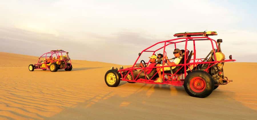 Huacachina: Sandboarding and Dune Buggy Tour + Sunset - Sandboarding on the Same Dunes