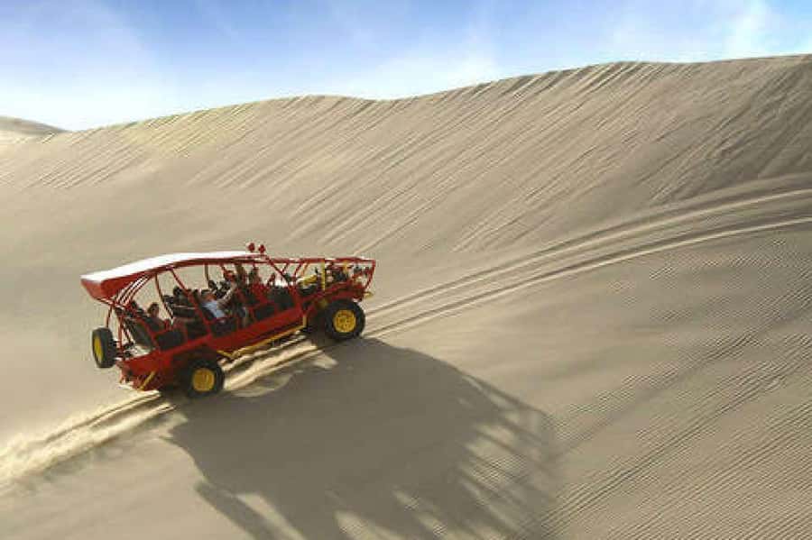 Huacachina: Sandboarding and Dune Buggy Tour + Sunset - Sunset Above the Oasis
