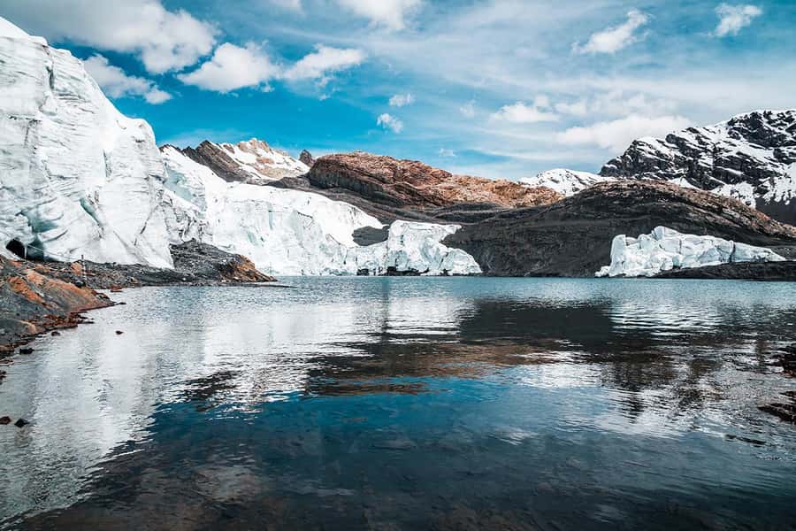 Huaraz-Excursion to the Pastoruri Snows and Puyas Raymondi - Patococha Lagoon sets the mountain mood