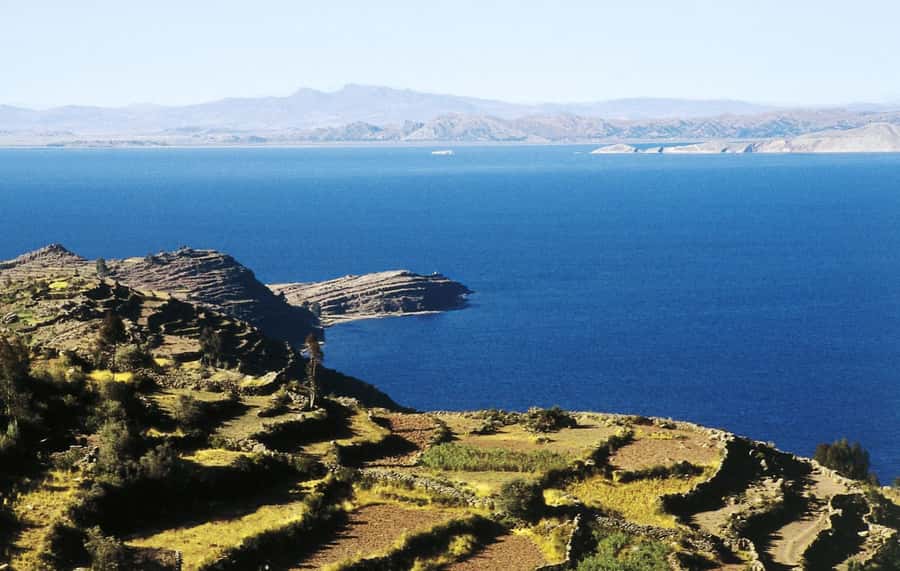 Lake Titicaca, Uros and Taquile Full-Day Tour - Reaching the Uros floating islands by boat