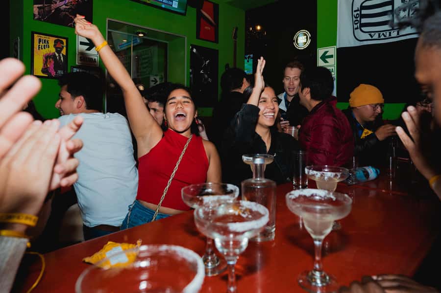 Lima: Miraflores Nightlife Tour with Bar Crawl & Free Shots - The third bar: dancing begins and the final shot