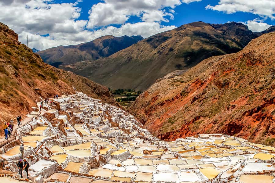 Maras Moray Sacred Valley Tour from Cusco - At Salineras, salt comes from the mountain
