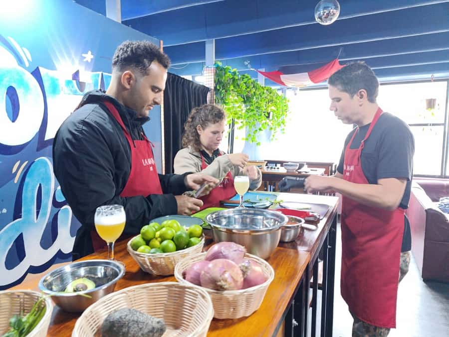 Miraflores: Amazing Peruvian Cooking Class Ceviche Seafood and Pisco Sour - Making tuna tartare with fresh fish