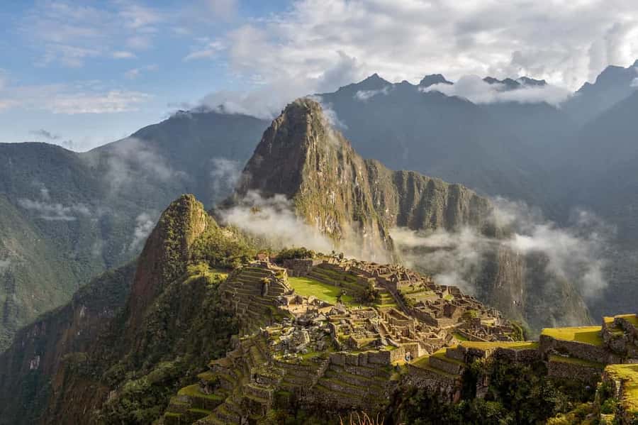 Sacred Valley & Machu Picchu by Train: 2-Day, 1-Night Tour - Pisac’s mountain ruins and market stalls