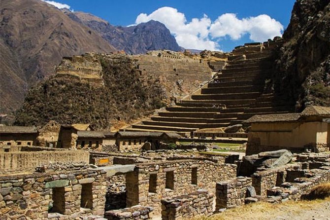 Sacred Valley with Moray & Salt Mines I Full Day Tour - Ollantaytambo, massive stones and a living town